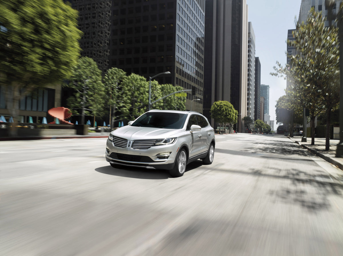 This archival image documents the 2016 Lincoln MKC action shot on city street and is preserved in the Ford Heritage Vault as part of Ford Motor Company's historic photographic archive. Free for personal, non-commercial use. Ford Heritage Vault ref...
