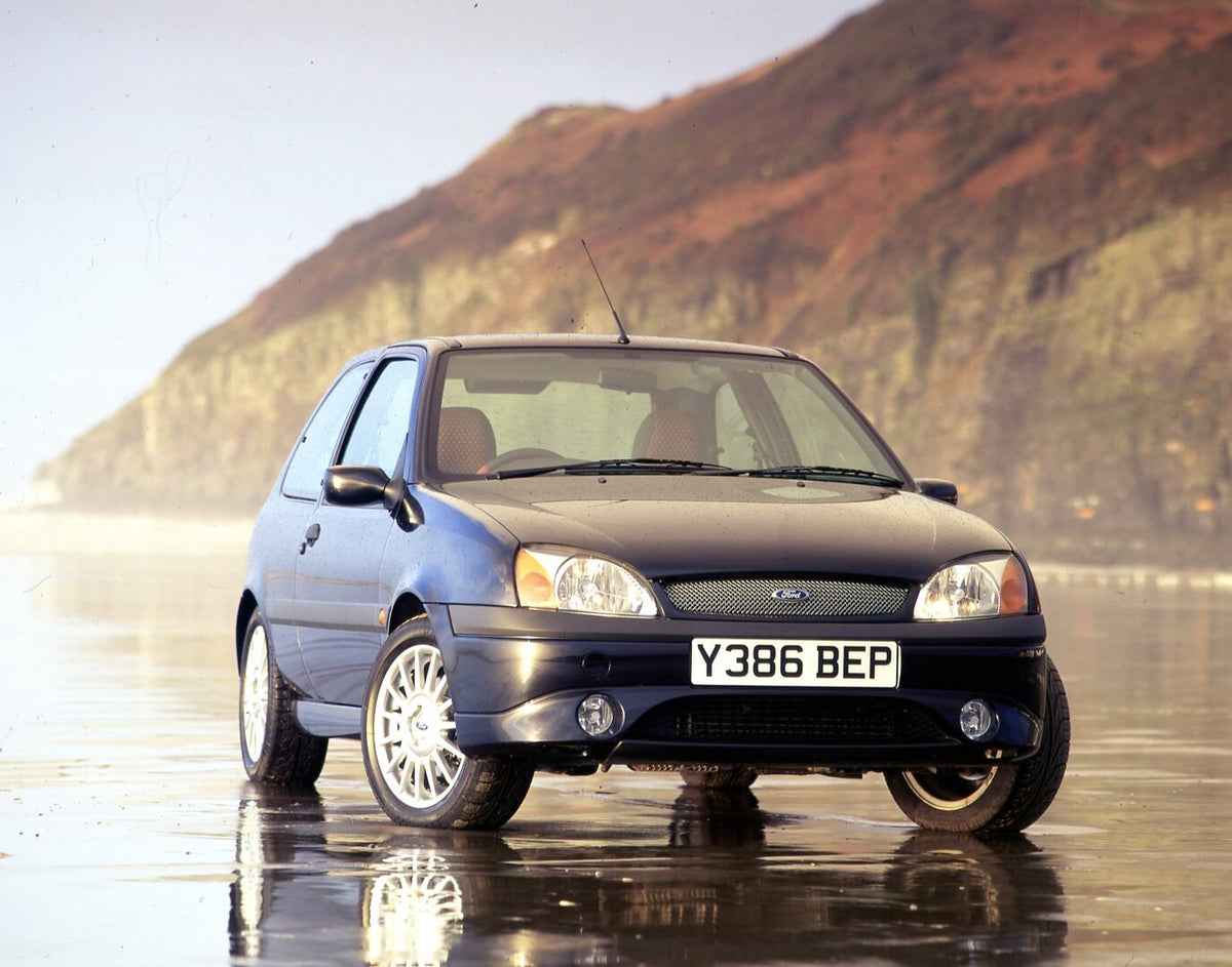 This archival image documents the 2001 Ford Fiesta Mark V Zetec-S on scenic beach and is preserved in the Ford Heritage Vault as part of Ford Motor Company's historic photographic archive. Free for personal, non-commercial use. Ford Heritage Vault...