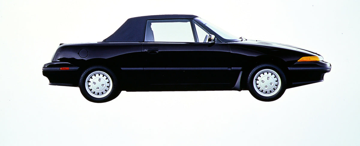 This archival image documents the 1991 Mercury Capri convertible and is preserved in the Ford Heritage Vault as part of Ford Motor Company's historic photographic archive. Free for personal, non-commercial use. Ford Heritage Vault reference AR-200...
