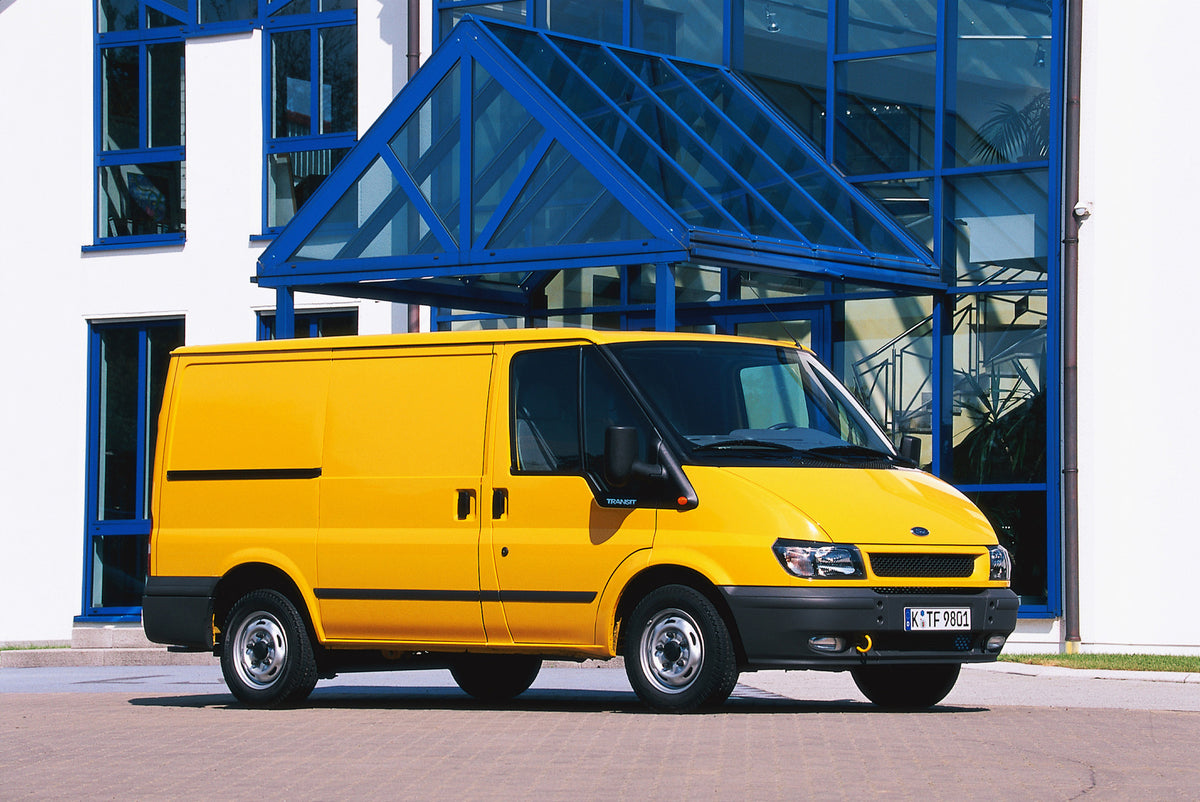 This archival image documents the 2000 Ford Transit Mark VI FWD in front of scenic building and is preserved in the Ford Heritage Vault as part of Ford Motor Company's historic photographic archive. Free for personal, non-commercial use. Ford Heri...