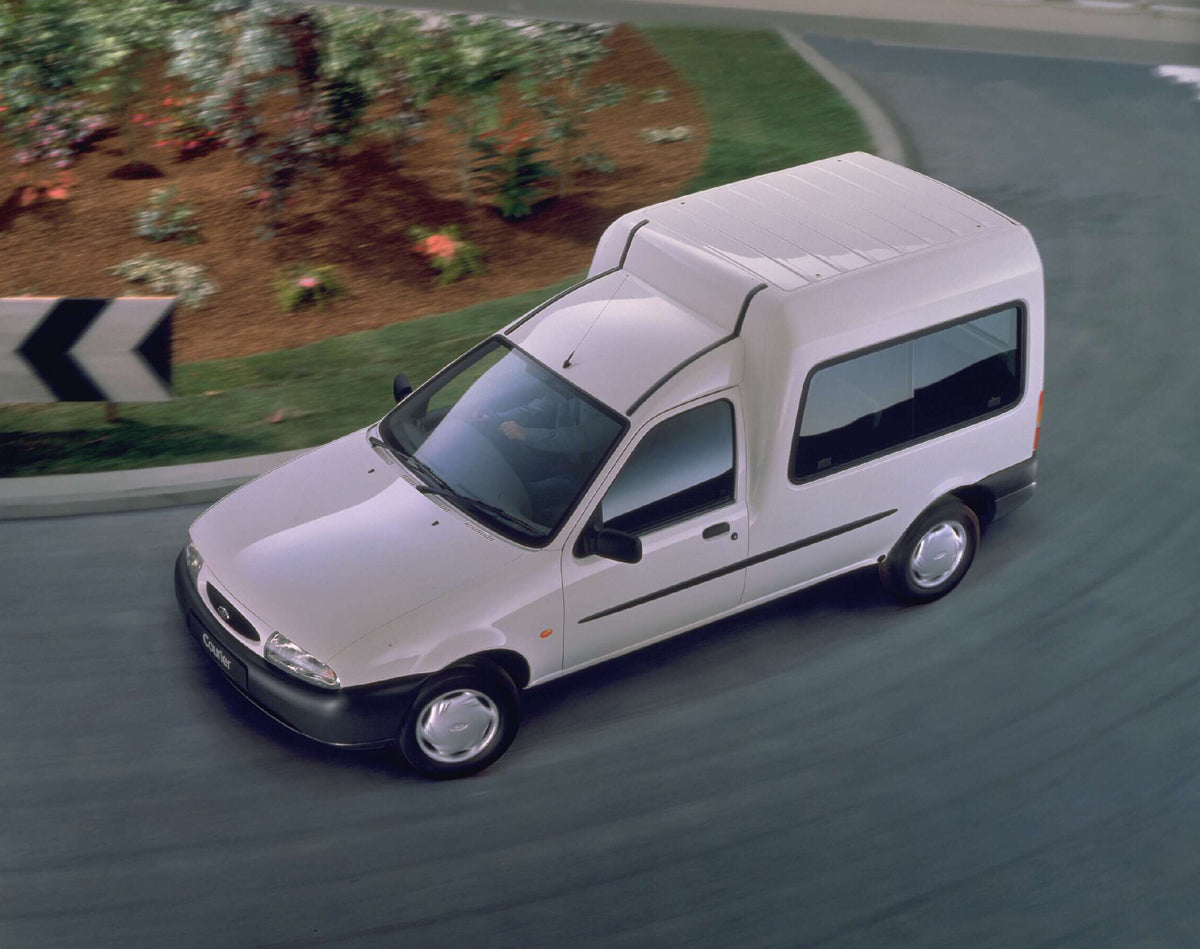 This archival image documents the 1996 Ford Fiesta Mark IV Kombi aerial view action shot on road AR-2002-213709 and is preserved in the Ford Heritage Vault as part of Ford Motor Company's historic photographic archive. Free for personal, non-comme...