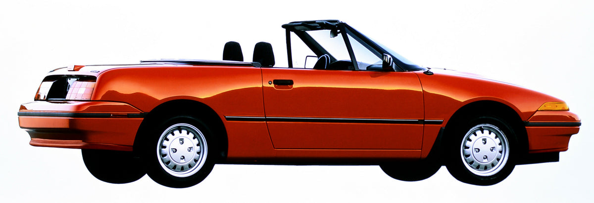 This archival image documents the 1992 Mercury Capri convertible and is preserved in the Ford Heritage Vault as part of Ford Motor Company's historic photographic archive. Free for personal, non-commercial use. Ford Heritage Vault reference AR-200...