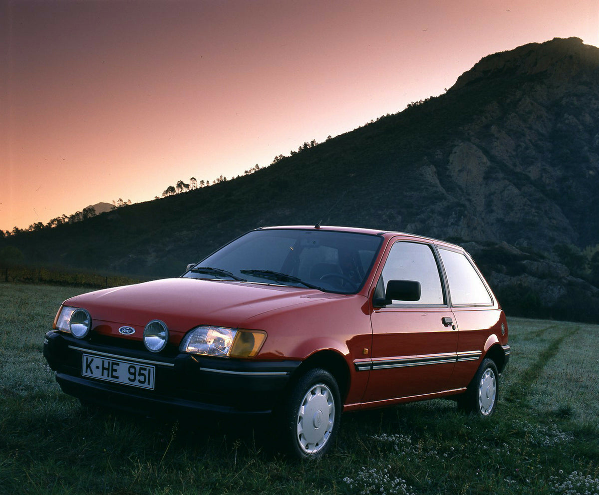 This archival image documents the 1989 Ford Fiesta Mark III LHD low view with scenic mountain and is preserved in the Ford Heritage Vault as part of Ford Motor Company's historic photographic archive. Free for personal, non-commercial use. Ford He...