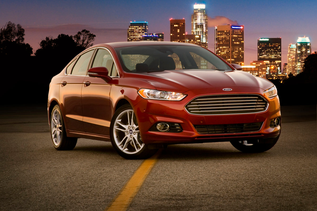 This archival image documents the 2012 Ford Fusion Titanium with city at night MS189135 and is preserved in the Ford Heritage Vault as part of Ford Motor Company's historic photographic archive. Free for personal, non-commercial use. Ford Heritage...