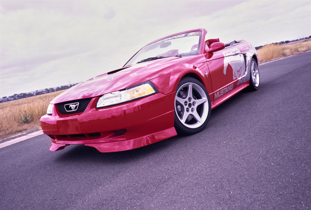 This archival image documents the 2001 Ford Racing Australia Mustang Driver Side Front End View on Race Track FAP-2011-3 and is preserved in the Ford Heritage Vault as part of Ford Motor Company's historic photographic archive. Free for personal, ...