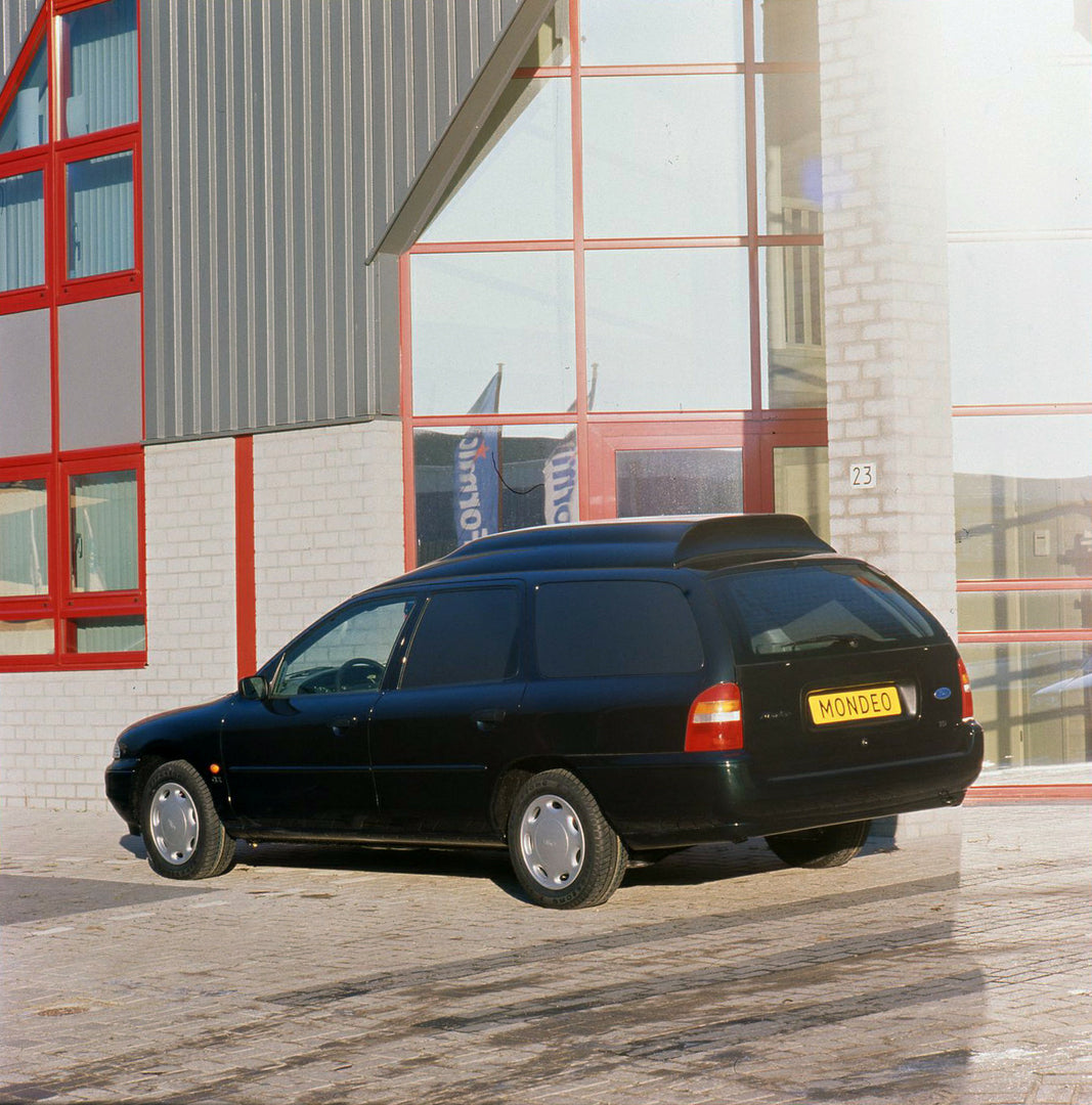 This archival image documents the 1996 Ford Mondeo Mark I LHD van in front of building and is preserved in the Ford Heritage Vault as part of Ford Motor Company's historic photographic archive. Free for personal, non-commercial use. Ford Heritage ...