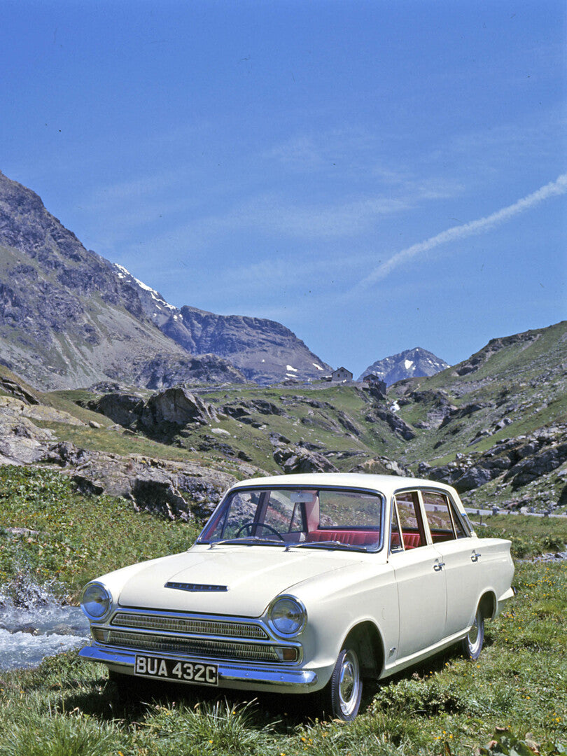 This archival image documents the 1964 Ford Cortina MKI front 3/4 view in mountains 1964-66 and is preserved in the Ford Heritage Vault as part of Ford Motor Company's historic photographic archive. Free for personal, non-commercial use. Ford Heri...