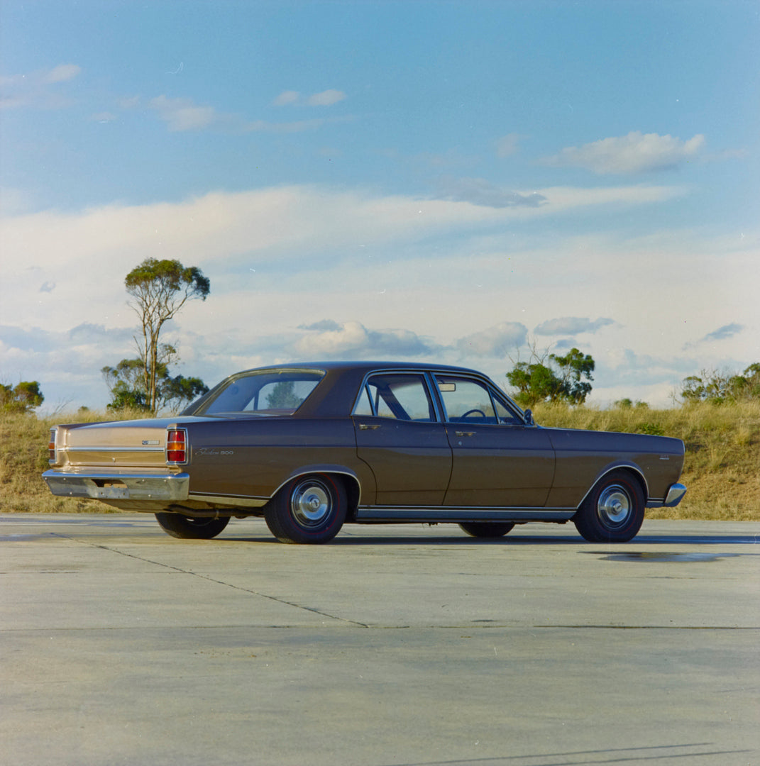 This archival image documents the 1969 Ford ZC Fairlane 500 Sedan Driver Side Rear End View in Empty Lot FAP-2011-3 and is preserved in the Ford Heritage Vault as part of Ford Motor Company's historic photographic archive. Free for personal, non-c...