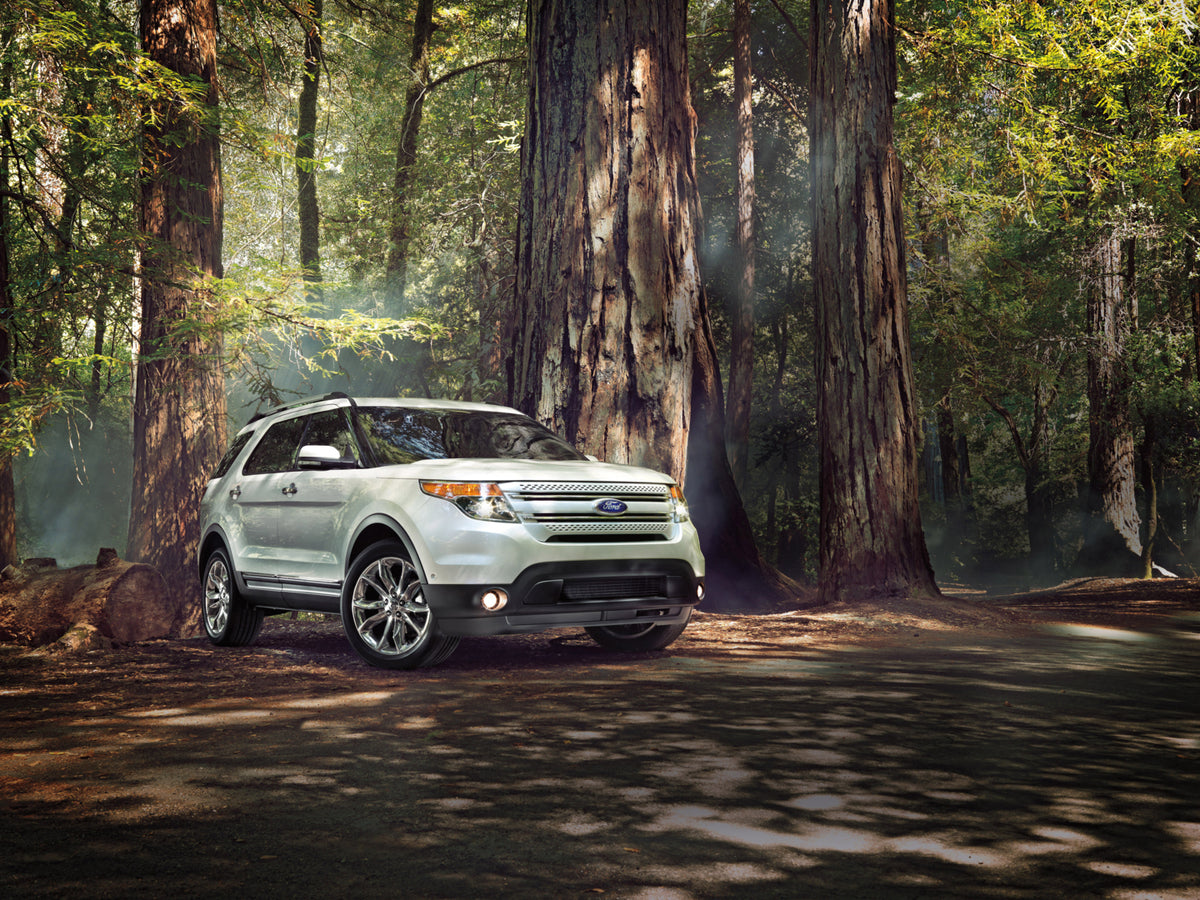 This archival image documents the 2013 Ford Explorer in scenic forest MS4606 and is preserved in the Ford Heritage Vault as part of Ford Motor Company's historic photographic archive. Free for personal, non-commercial use. Ford Heritage Vault refe...