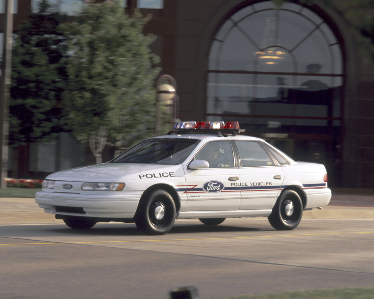 This archival image documents the 1993 Ford Taurus police package and is preserved in the Ford Heritage Vault as part of Ford Motor Company's historic photographic archive. Free for personal, non-commercial use. Ford Heritage Vault reference AR-20...