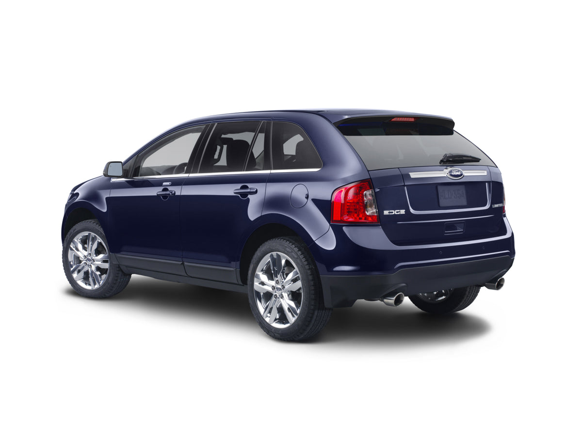 This archival image documents the 2013 Ford Edge rear view in studio MS7039 and is preserved in the Ford Heritage Vault as part of Ford Motor Company's historic photographic archive. Free for personal, non-commercial use. Ford Heritage Vault refer...