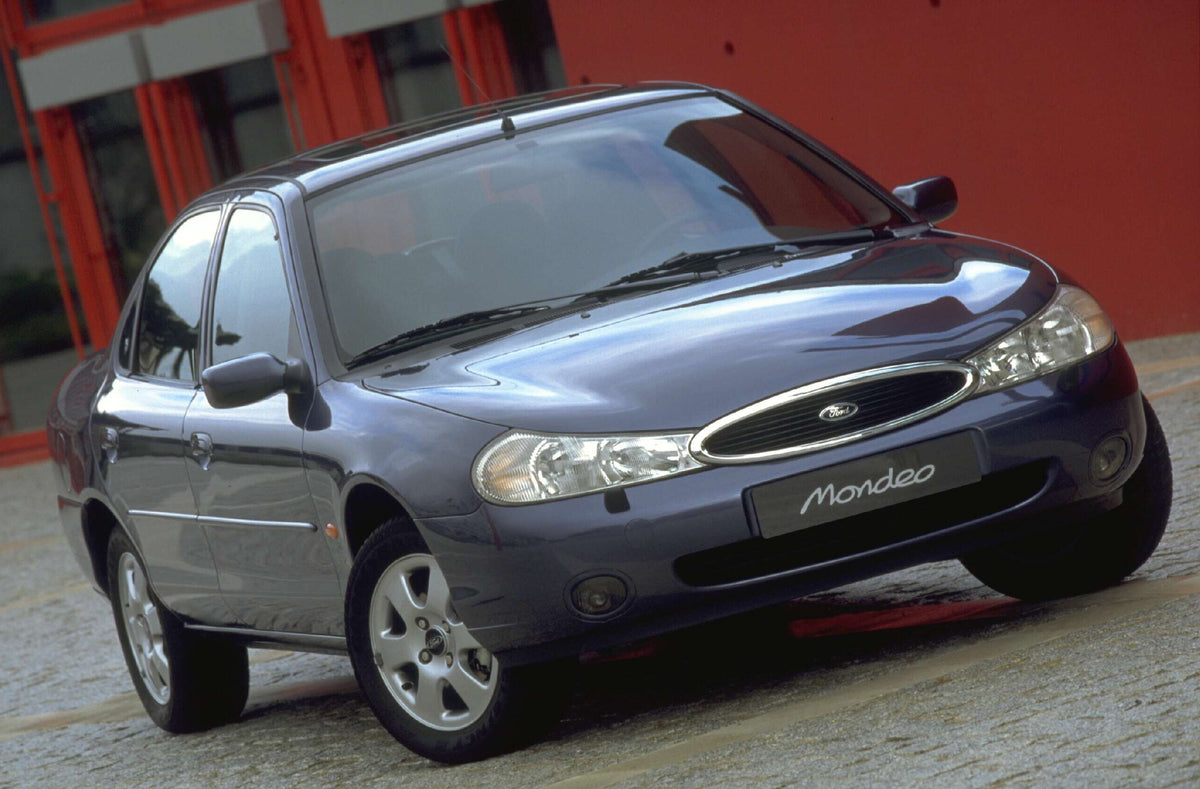 This archival image documents the 1996 Ford Mondeo Mark I Ghia closeup on street AR-2002-213709 and is preserved in the Ford Heritage Vault as part of Ford Motor Company's historic photographic archive. Free for personal, non-commercial use. Ford ...