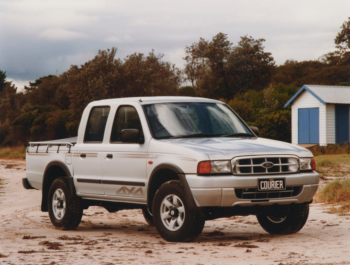 This archival image documents the 2000 Ford Courier XLT Turbo Diesel Pickup Truck Driver Side Front End View on the Beach FAP-2011-3 and is preserved in the Ford Heritage Vault as part of Ford Motor Company's historic photographic archive. Free fo...