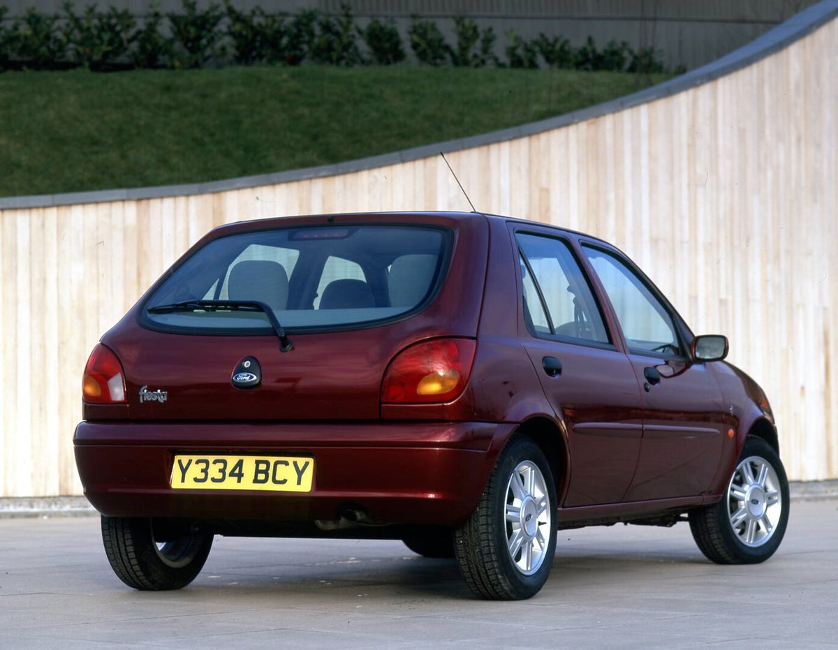 This archival image documents the 2001 Ford Fiesta Mark V Ghia rear view in front of wood paneled wall and is preserved in the Ford Heritage Vault as part of Ford Motor Company's historic photographic archive. Free for personal, non-commercial use...