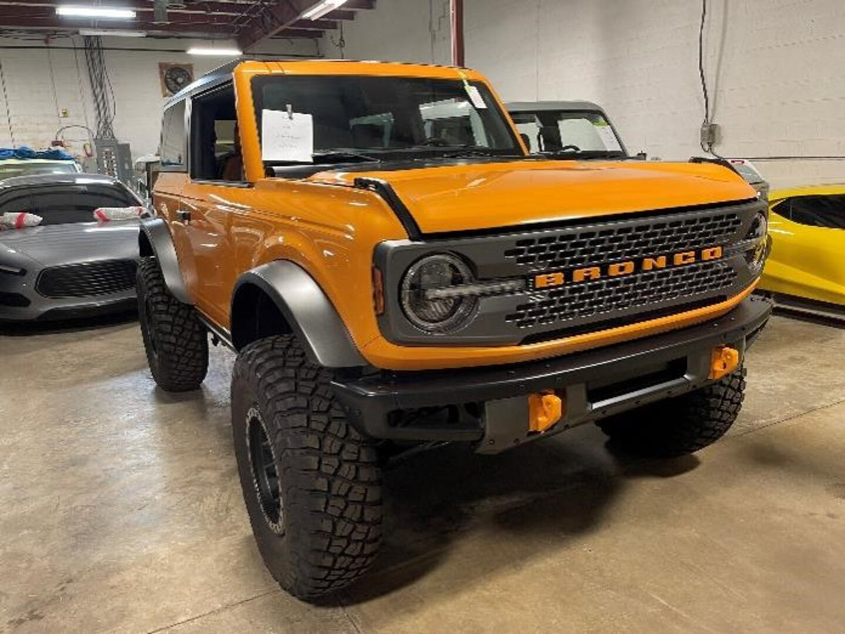 This archival image documents the 2021 Ford Bronco 2-door (U-725) and is preserved in the Ford Heritage Vault as part of Ford Motor Company's historic photographic archive. Free for personal, non-commercial use. Ford Heritage Vault reference AR-20...
