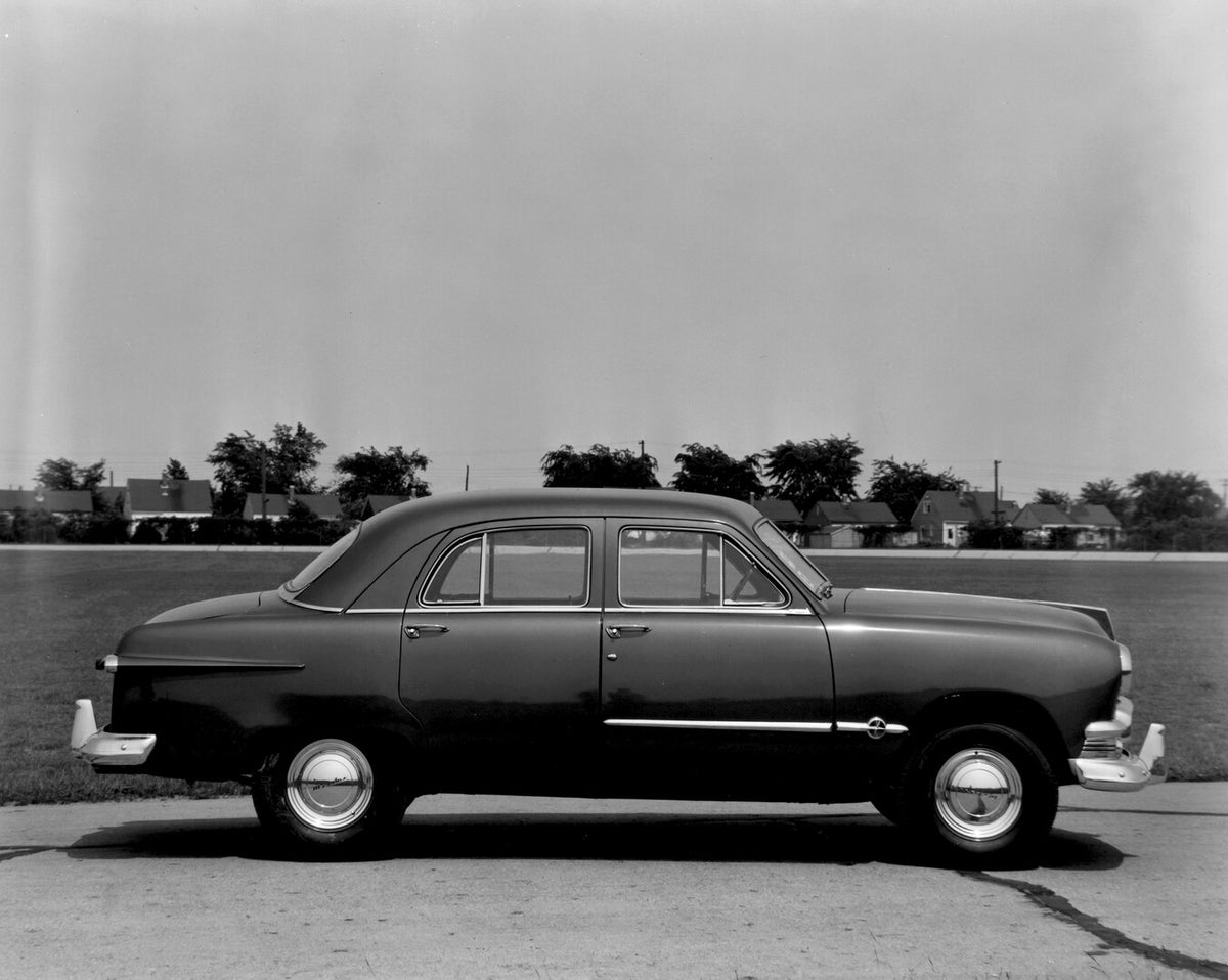 This archival image documents the 1951 Meteor Sedan side view on road with houses in distance AR-2007-5 and is preserved in the Ford Heritage Vault as part of Ford Motor Company's historic photographic archive. Free for personal, non-commercial us...