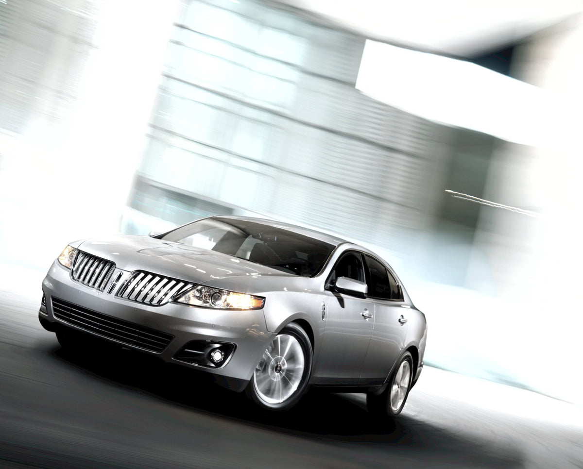 This archival image documents the 2012 Lincoln MKS action shot MS904 and is preserved in the Ford Heritage Vault as part of Ford Motor Company's historic photographic archive. Free for personal, non-commercial use. Ford Heritage Vault reference AR...