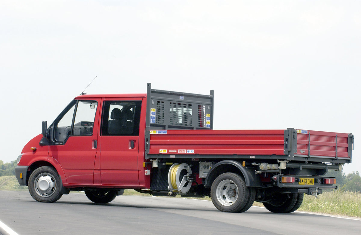 This archival image documents the 2003 Ford Transit Mark IV conversion rear view on scenic road and is preserved in the Ford Heritage Vault as part of Ford Motor Company's historic photographic archive. Free for personal, non-commercial use. Ford ...