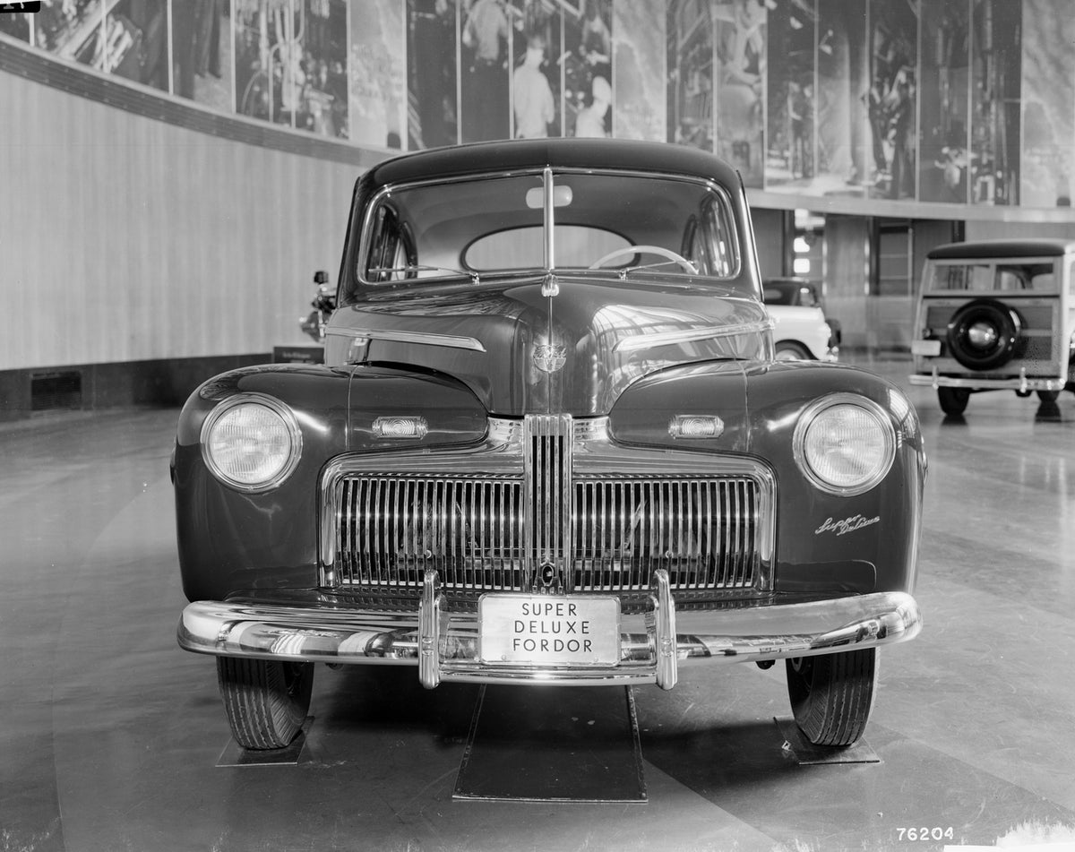 This archival image documents the 1942 Ford Super DeLuxe fordor sedan front close up and is preserved in the Ford Heritage Vault as part of Ford Motor Company's historic photographic archive. Free for personal, non-commercial use. Ford Heritage Va...