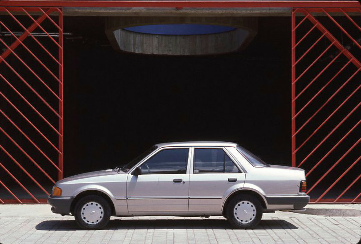 This archival image documents the 1986 Ford Orion Mark II side view in front of scenic building and is preserved in the Ford Heritage Vault as part of Ford Motor Company's historic photographic archive. Free for personal, non-commercial use. Ford ...