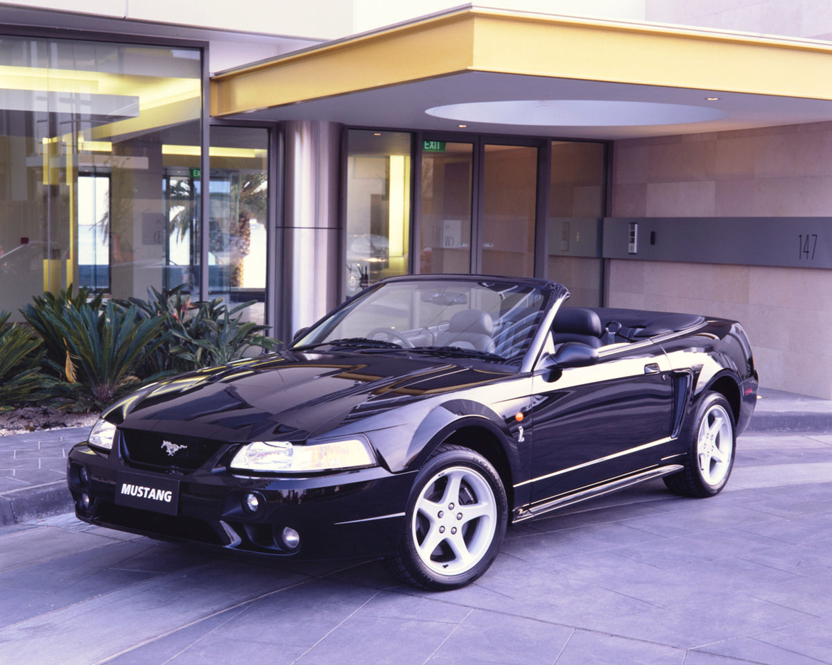 This archival image documents the 2001 Ford Mustang Cobra Convertible Passenger Side Front End View in Driveway FAP-2011-3 and is preserved in the Ford Heritage Vault as part of Ford Motor Company's historic photographic archive. Free for personal...