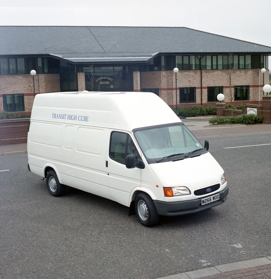 This archival image documents the 1995 Ford Transit Mark III High Cube on road in front of building and is preserved in the Ford Heritage Vault as part of Ford Motor Company's historic photographic archive. Free for personal, non-commercial use. F...