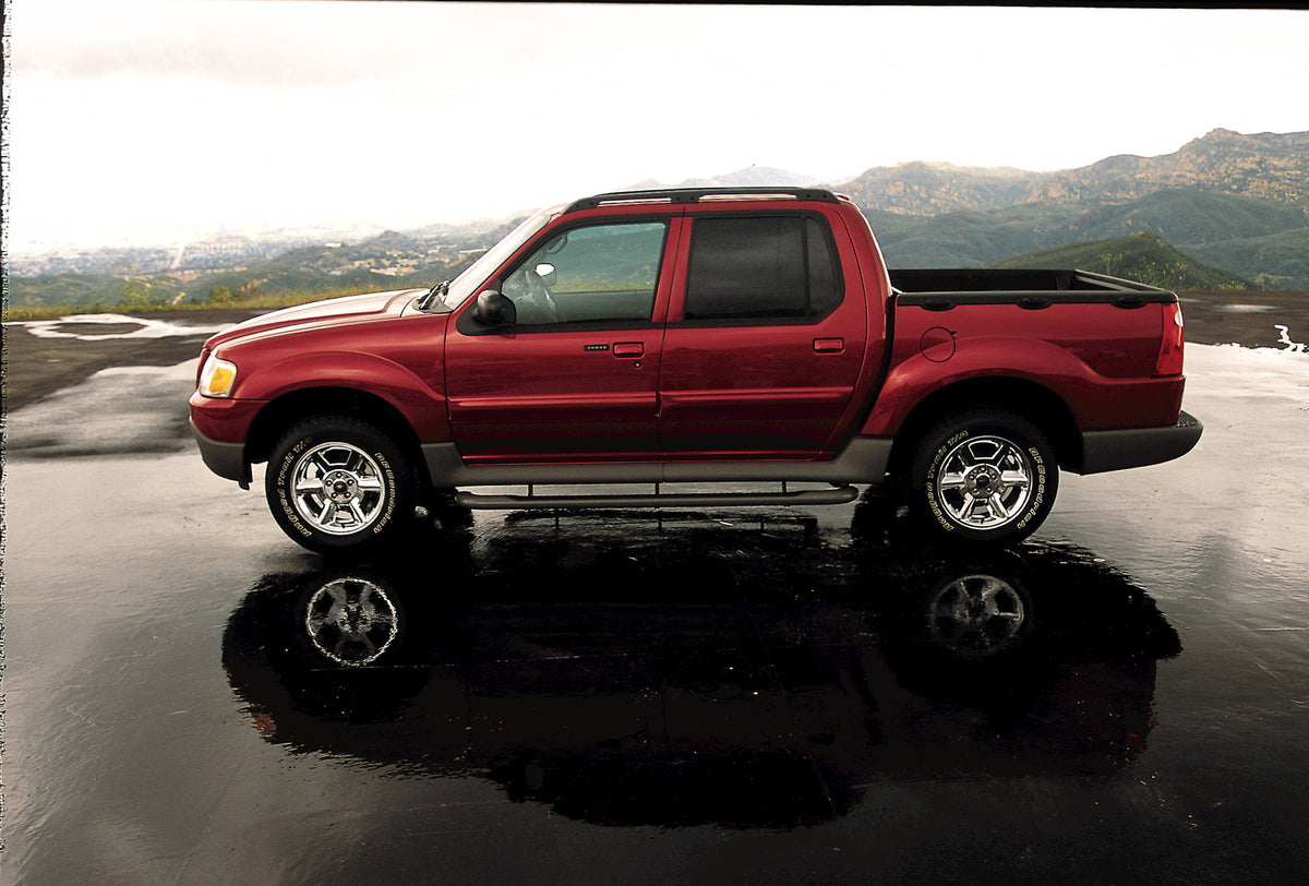 This archival image documents the 2004 Ford Explorer Sport Trac and is preserved in the Ford Heritage Vault as part of Ford Motor Company's historic photographic archive. Free for personal, non-commercial use. Ford Heritage Vault reference AR-2008...