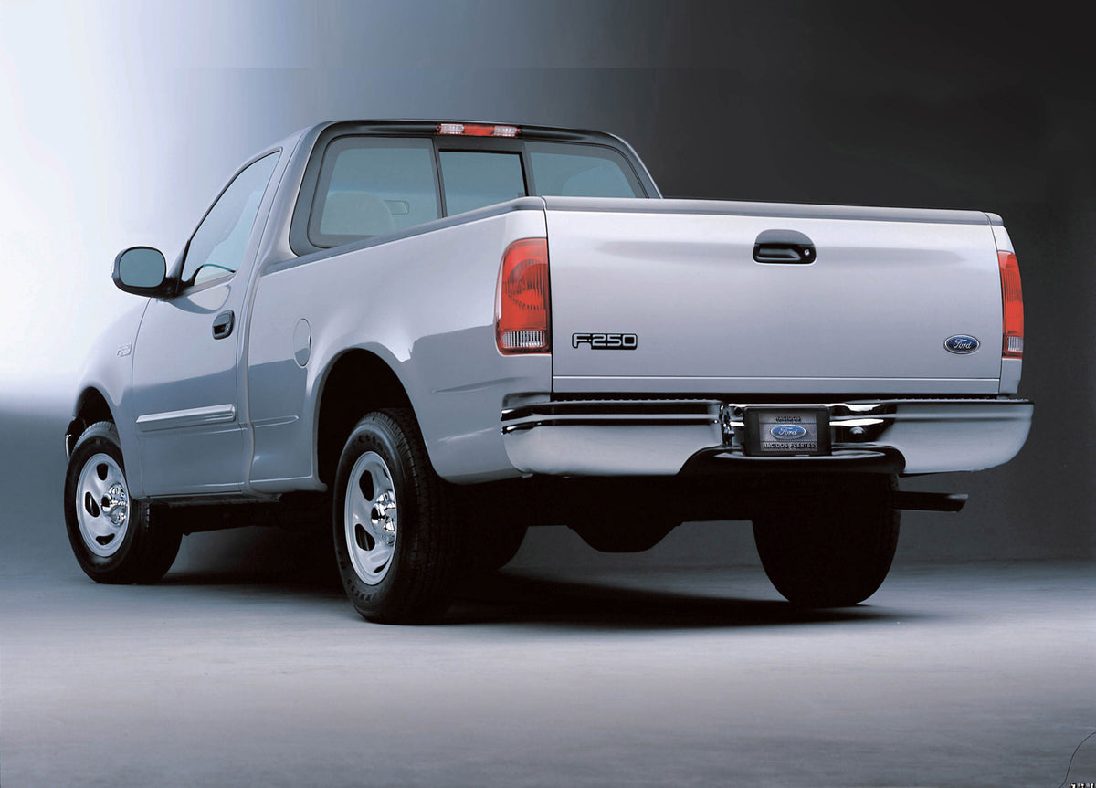 This archival image documents the 2002 Ford F-250 rear view in studio MS1284 and is preserved in the Ford Heritage Vault as part of Ford Motor Company's historic photographic archive. Free for personal, non-commercial use. Ford Heritage Vault refe...