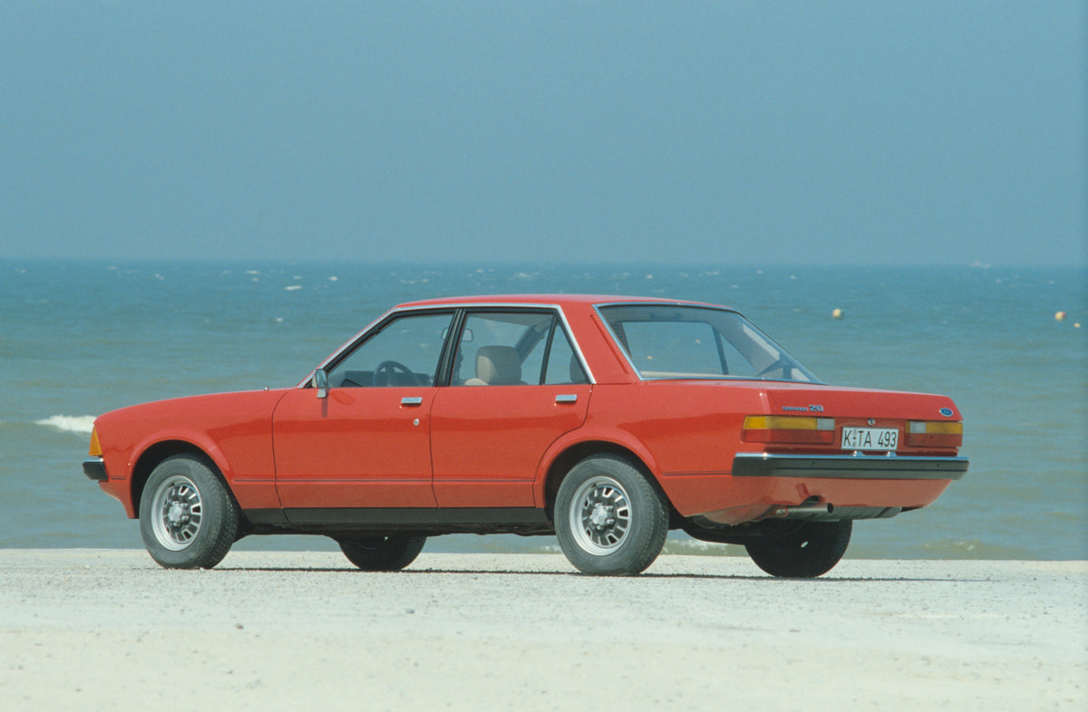 This archival image documents the 1979 Ford Granada Mark II rear view on scenic beach and is preserved in the Ford Heritage Vault as part of Ford Motor Company's historic photographic archive. Free for personal, non-commercial use. Ford Heritage V...