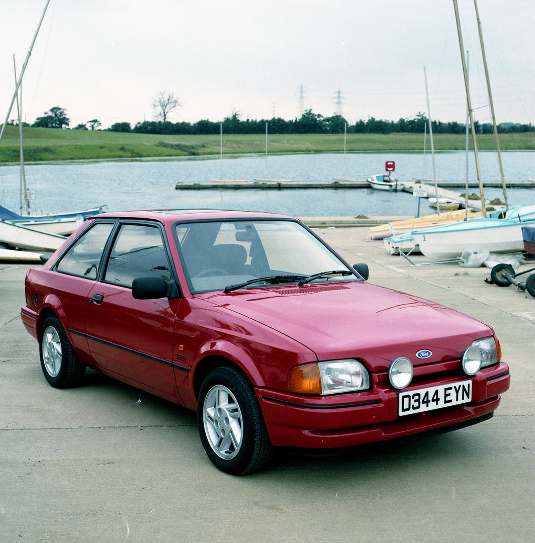 This archival image documents the 1986 Ford Escort Mark IV XR3i in scenic harbor and is preserved in the Ford Heritage Vault as part of Ford Motor Company's historic photographic archive. Free for personal, non-commercial use. Ford Heritage Vault ...