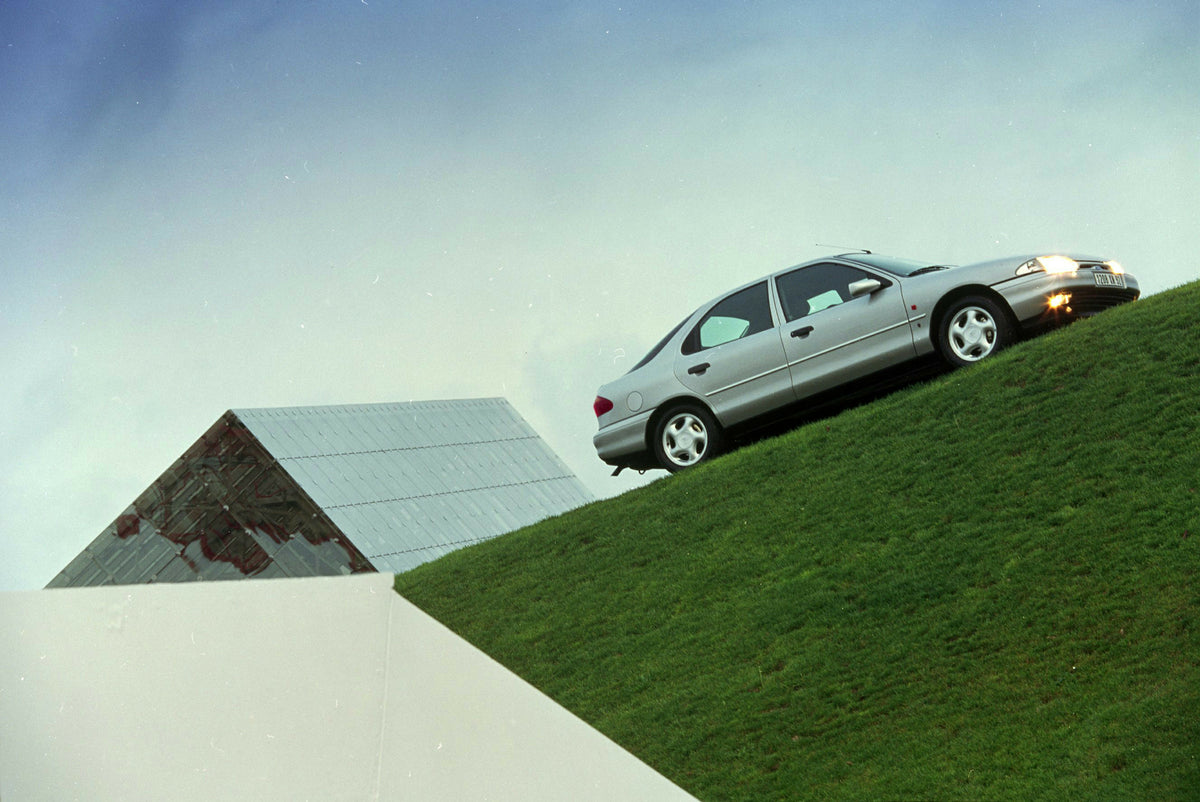This archival image documents the 1992 Ford Mondeo Mark I side view on scenic hill in Paris and is preserved in the Ford Heritage Vault as part of Ford Motor Company's historic photographic archive. Free for personal, non-commercial use. Ford Heri...