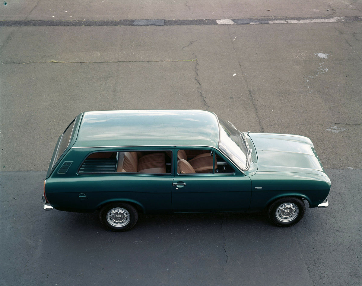 This archival image documents the 1969 Ford Taunus 26M aerial side view on pavement and is preserved in the Ford Heritage Vault as part of Ford Motor Company's historic photographic archive. Free for personal, non-commercial use. Ford Heritage Vau...
