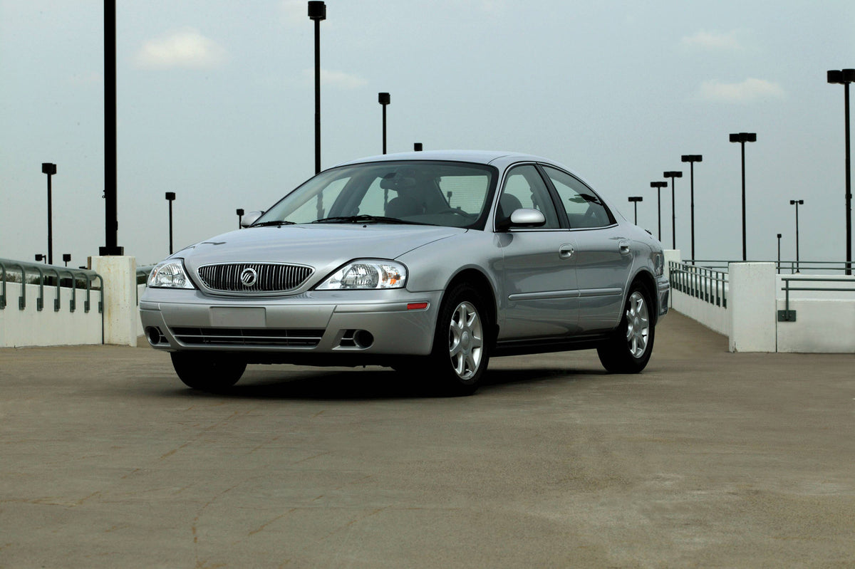 This archival image documents the 2004 Mercury Sable with Lamp Posts in Background and is preserved in the Ford Heritage Vault as part of Ford Motor Company's historic photographic archive. Free for personal, non-commercial use. Ford Heritage Vaul...