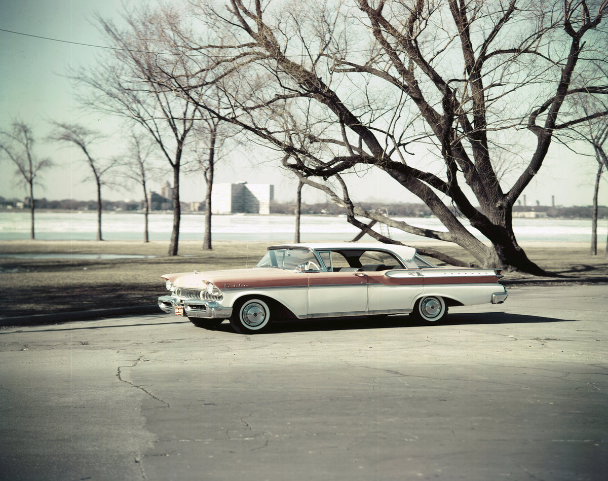 This archival image documents the 1957 Mercury Montclair four-door hardtop with Cityscape in Background and is preserved in the Ford Heritage Vault as part of Ford Motor Company's historic photographic archive. Free for personal, non-commercial us...