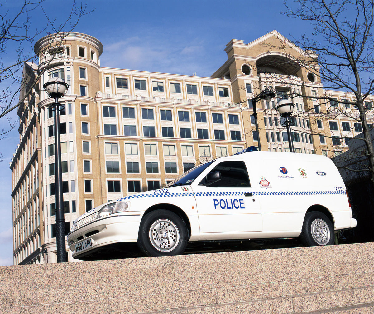 This archival image documents the 1995 Ford Escort Mark V Electric Police Van low view with scenic building in London and is preserved in the Ford Heritage Vault as part of Ford Motor Company's historic photographic archive. Free for personal, non...
