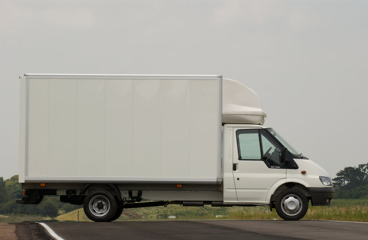 This archival image documents the 2003 Ford Transit Mark IV conversion box truck side view on scenic road and is preserved in the Ford Heritage Vault as part of Ford Motor Company's historic photographic archive. Free for personal, non-commercial ...