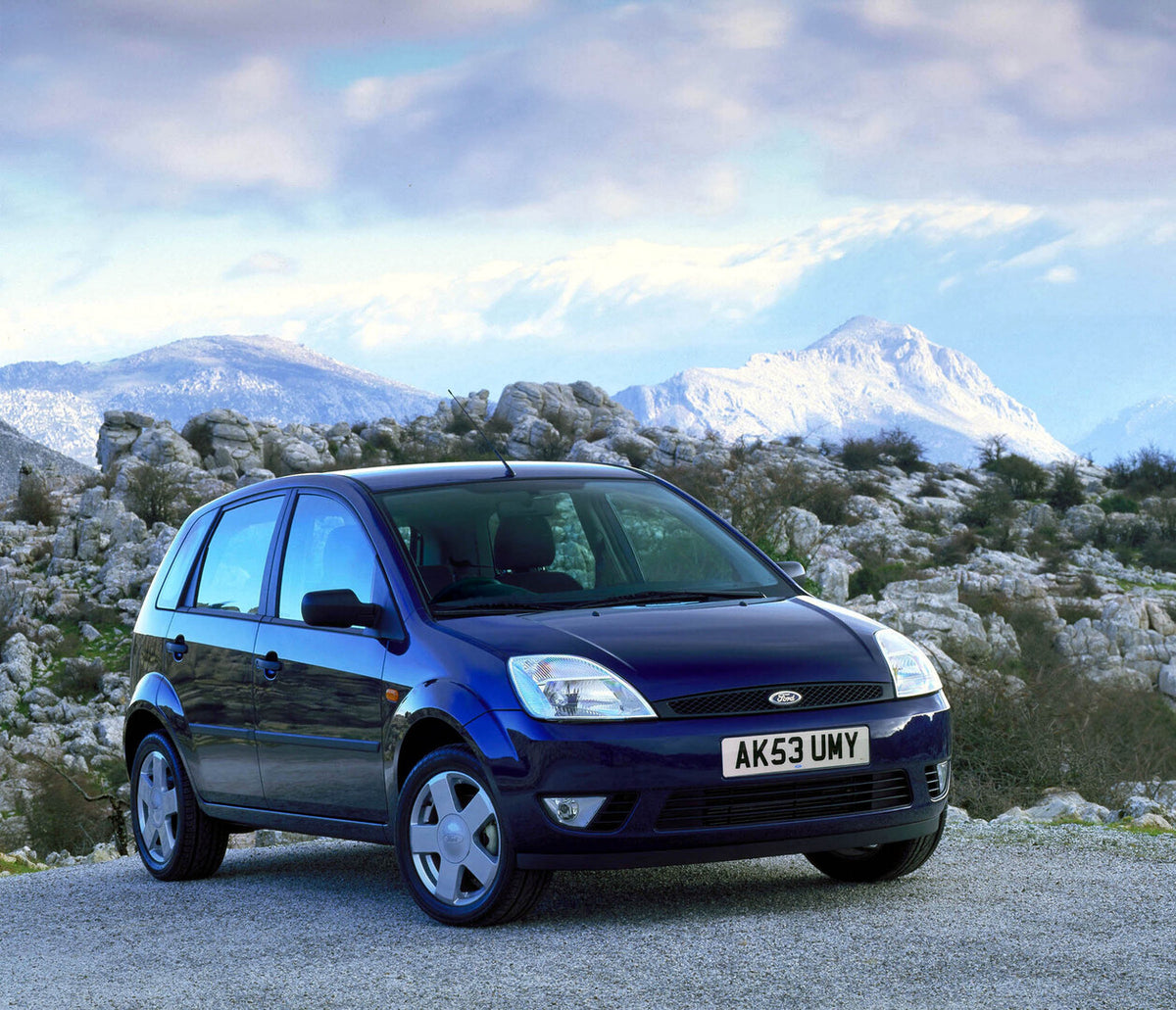 This archival image documents the 2003 Ford Fiesta Mark VI with scenic mountains and is preserved in the Ford Heritage Vault as part of Ford Motor Company's historic photographic archive. Free for personal, non-commercial use. Ford Heritage Vault ...
