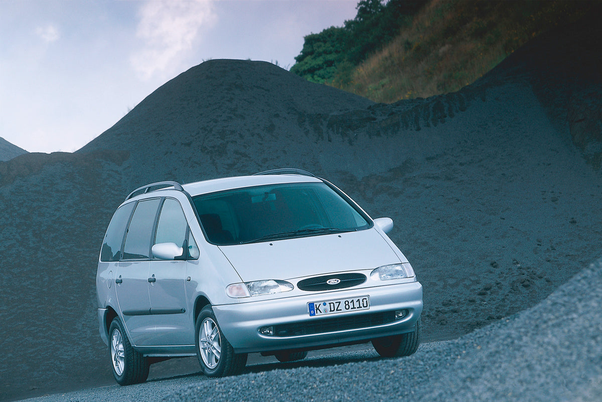 This archival image documents the 1999 Ford Galaxy on gravel road with scenic hills and is preserved in the Ford Heritage Vault as part of Ford Motor Company's historic photographic archive. Free for personal, non-commercial use. Ford Heritage Vau...