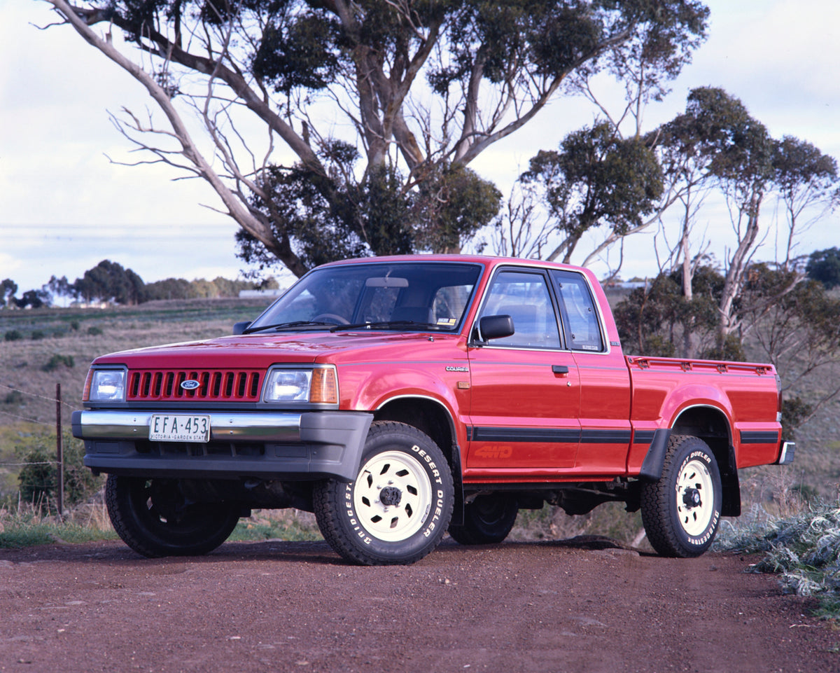 This archival image documents the 1991 Ford Courier 4WD Pickup Truck Passenger Side Front End View on Country Road FAP-2011-3 and is preserved in the Ford Heritage Vault as part of Ford Motor Company's historic photographic archive. Free for perso...