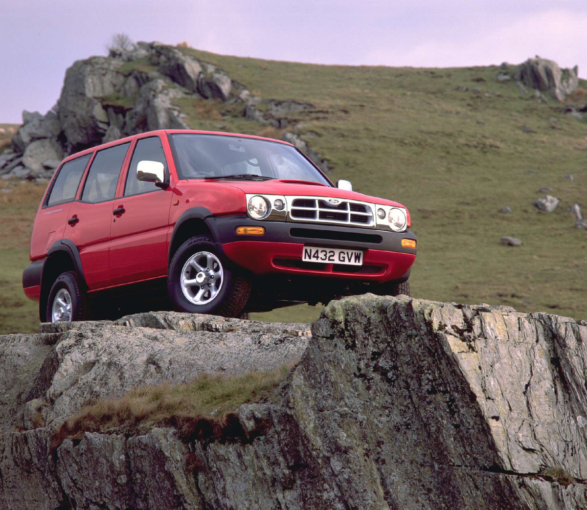 This archival image documents the 1997 Ford Maverick GLS on scenic cliff AR-2002-213709 and is preserved in the Ford Heritage Vault as part of Ford Motor Company's historic photographic archive. Free for personal, non-commercial use. Ford Heritage...