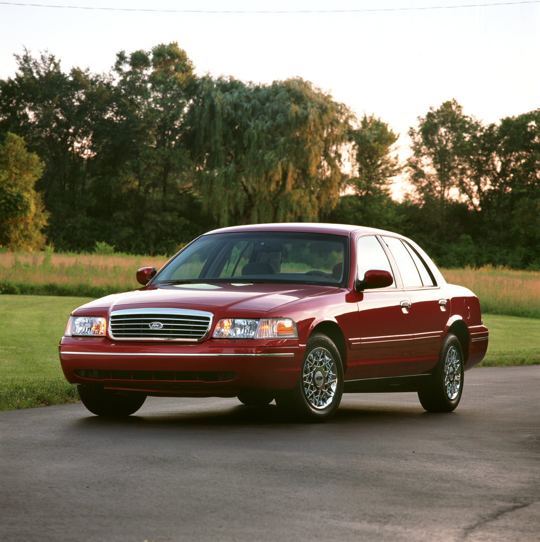 This archival image documents the 1998 Ford Crown Victoria LX and is preserved in the Ford Heritage Vault as part of Ford Motor Company's historic photographic archive. Free for personal, non-commercial use. Ford Heritage Vault reference AR-2008-8...