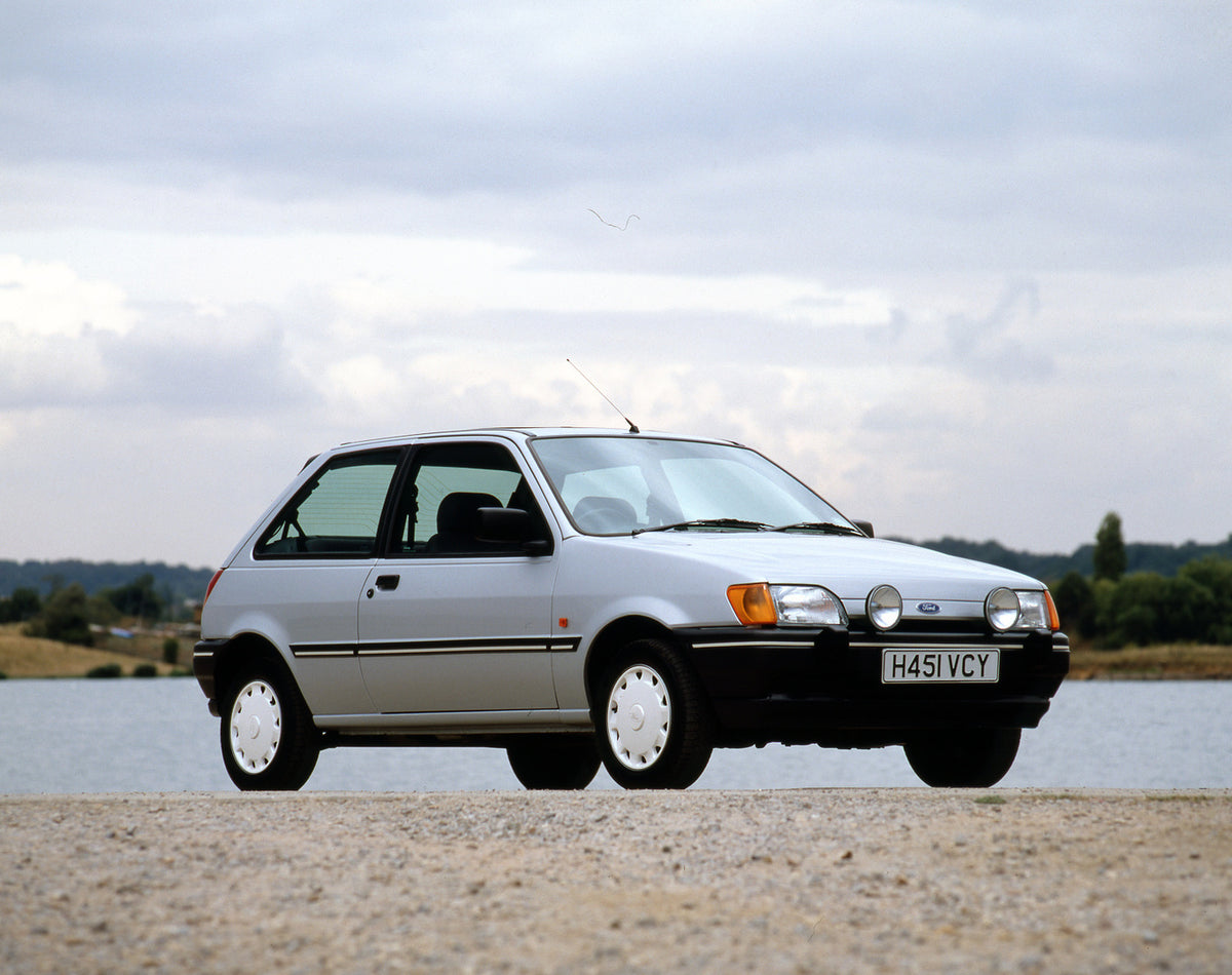 This archival image documents the 1990 Ford Fiesta Mark III S on scenic beach and is preserved in the Ford Heritage Vault as part of Ford Motor Company's historic photographic archive. Free for personal, non-commercial use. Ford Heritage Vault ref...