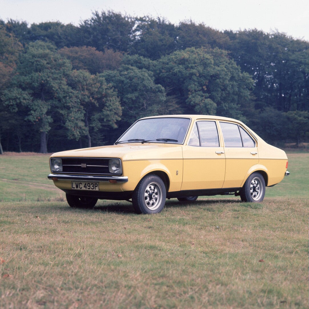 This archival image documents the 1975 Ford Escort MKII 3/4 view with trees in background 1975-979 and is preserved in the Ford Heritage Vault as part of Ford Motor Company's historic photographic archive. Free for personal, non-commercial use. Fo...