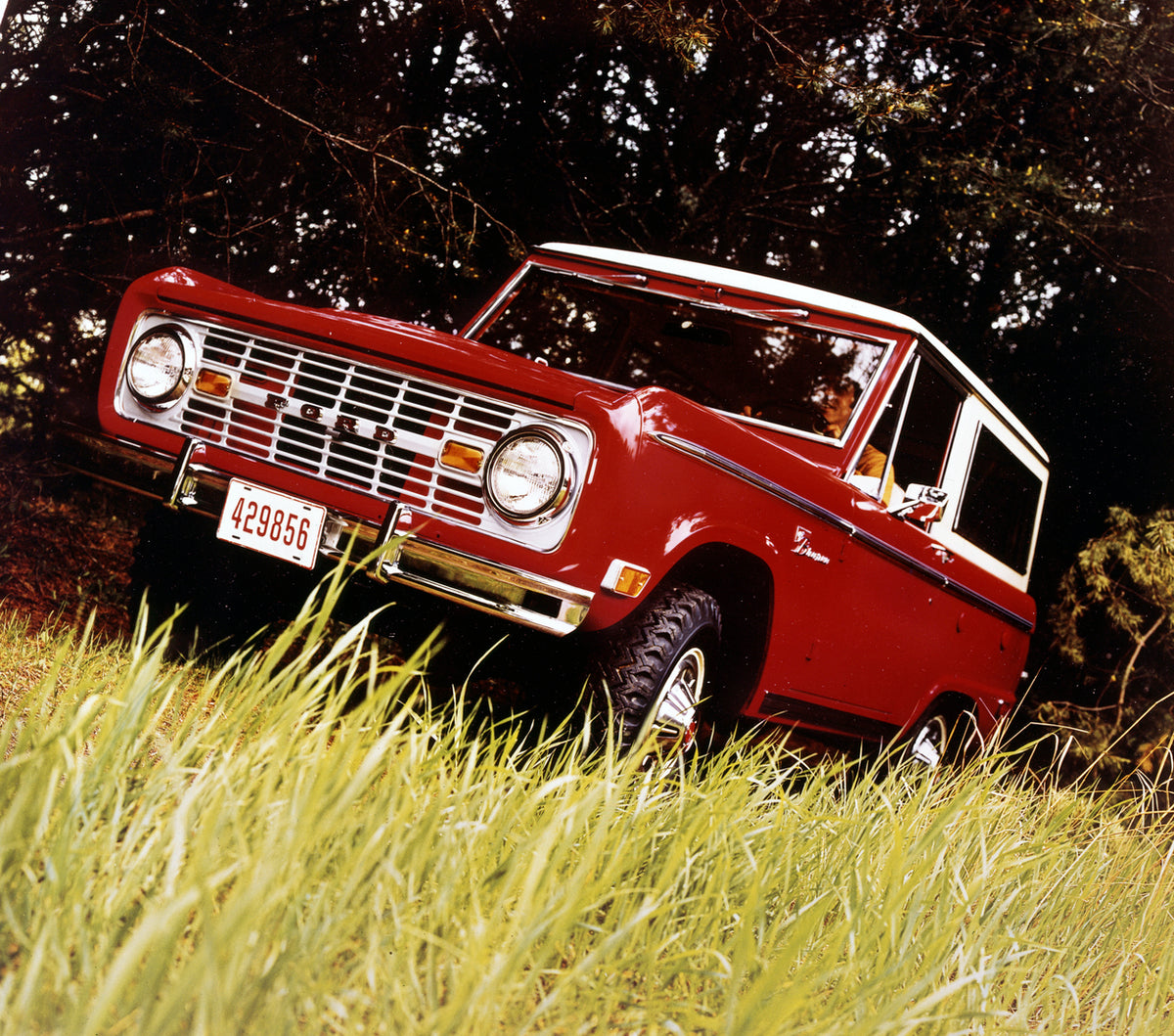 This archival image documents the 1969 Bronco Wagon in outdoor setting T69-100 and is preserved in the Ford Heritage Vault as part of Ford Motor Company's historic photographic archive. Free for personal, non-commercial use. Ford Heritage Vault re...