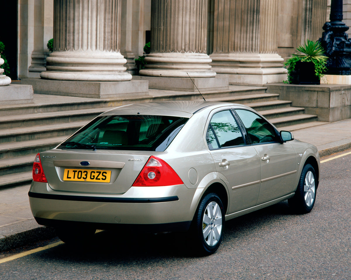 This archival image documents the 2003 Ford Mondeo Mark II rear view with scenic pillars and is preserved in the Ford Heritage Vault as part of Ford Motor Company's historic photographic archive. Free for personal, non-commercial use. Ford Heritag...