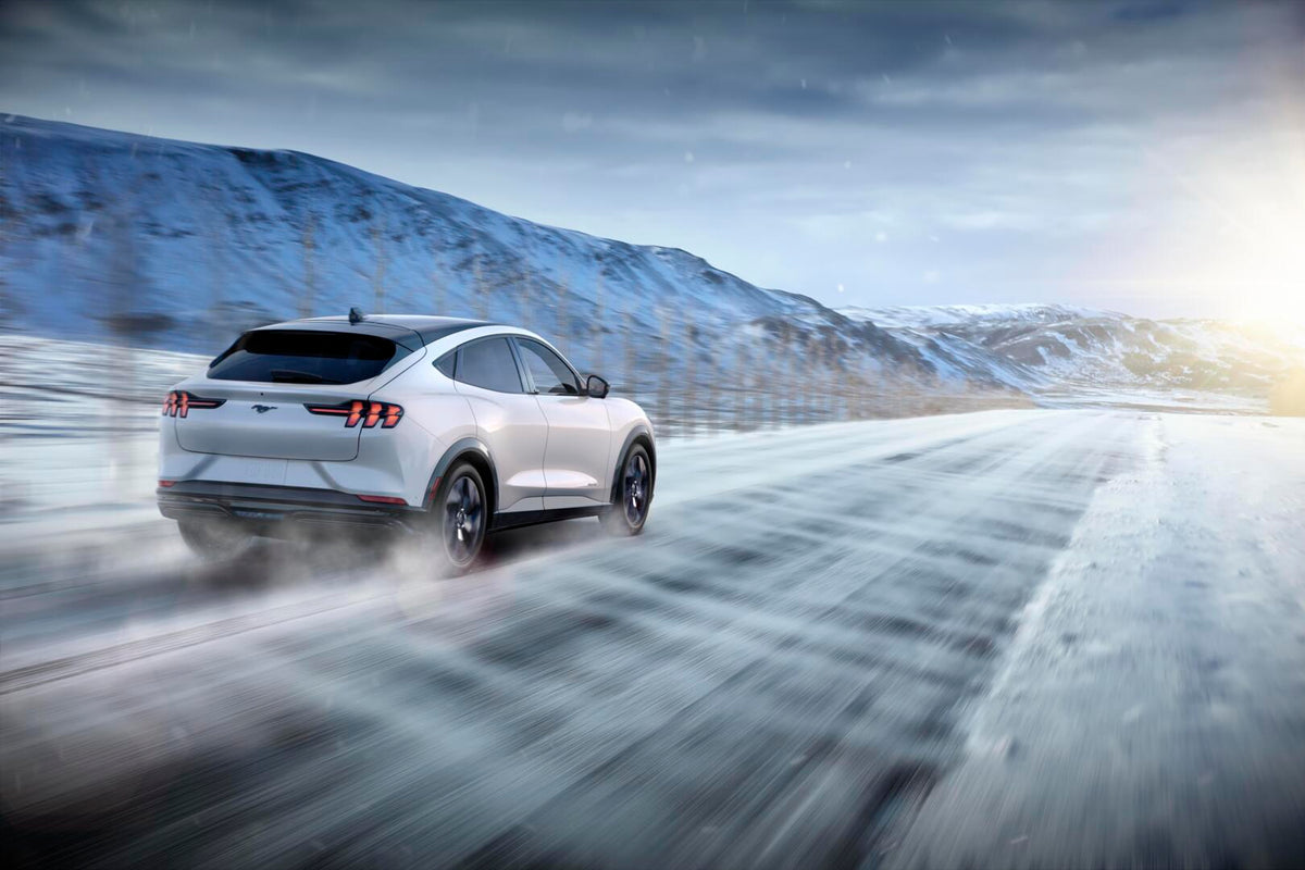 This archival image documents the 2021 Ford Mach-E action shot on snowy road MS48126 and is preserved in the Ford Heritage Vault as part of Ford Motor Company's historic photographic archive. Free for personal, non-commercial use. Ford Heritage Va...