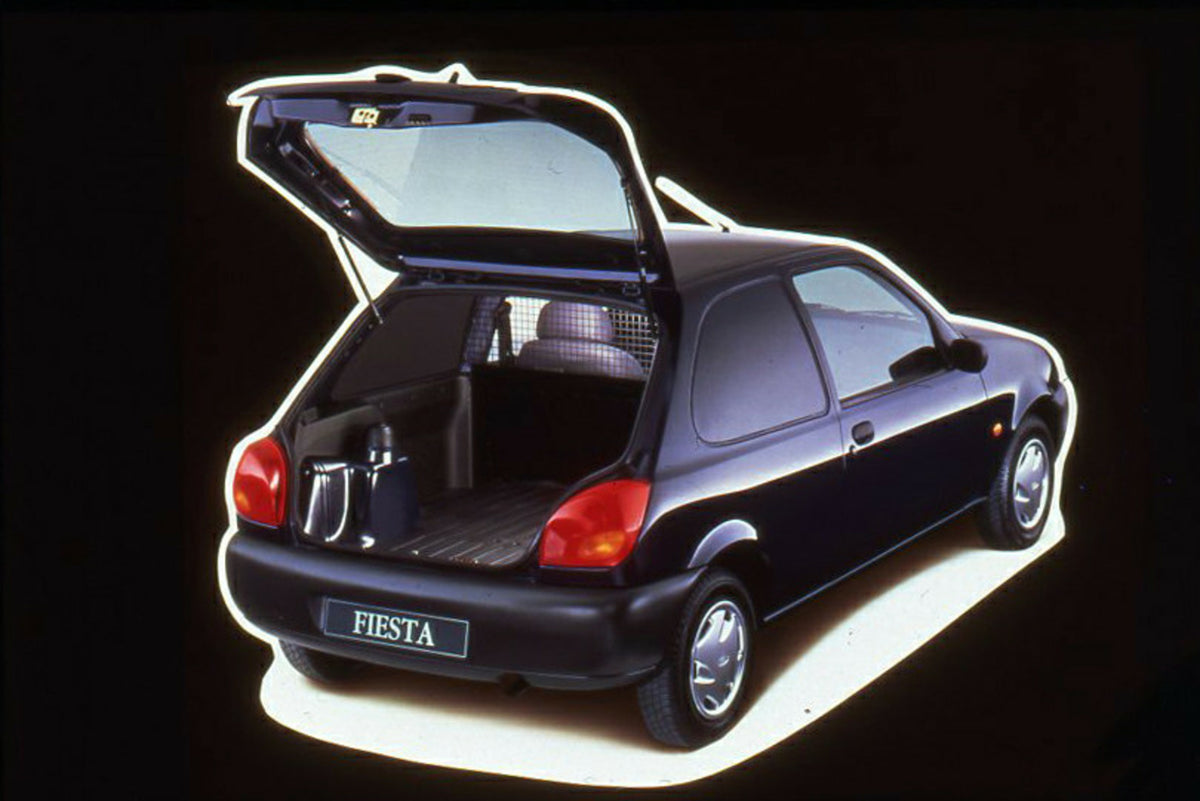 This archival image documents the 1996 Ford Fiesta Mark IV van with rear hatch open in studio and is preserved in the Ford Heritage Vault as part of Ford Motor Company's historic photographic archive. Free for personal, non-commercial use. Ford He...