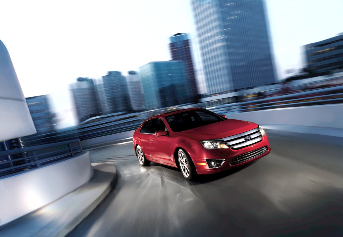 This archival image documents the 2011 Ford Fusion SEL city action shot and is preserved in the Ford Heritage Vault as part of Ford Motor Company's historic photographic archive. Free for personal, non-commercial use. Ford Heritage Vault reference...
