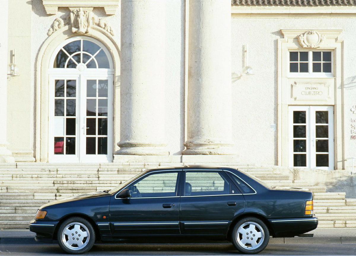 This archival image documents the 1990 Ford Scorpio 24 Valve Mark I in front of building and is preserved in the Ford Heritage Vault as part of Ford Motor Company's historic photographic archive. Free for personal, non-commercial use. Ford Heritag...