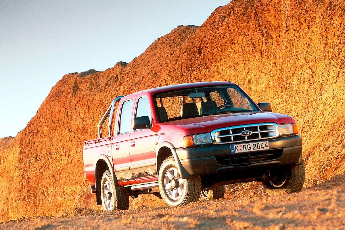 This archival image documents the 2001 Ford Ranger with scenic rock formation and is preserved in the Ford Heritage Vault as part of Ford Motor Company's historic photographic archive. Free for personal, non-commercial use. Ford Heritage Vault ref...
